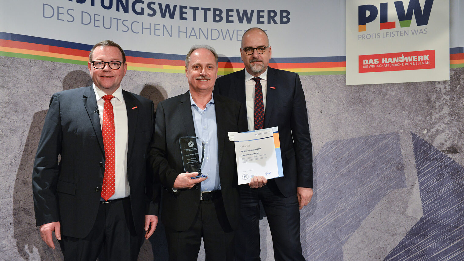 © Thomas Rittelmann | (v.l.n.r.): Präsident Klaus Hofmann, Thomas Bausch, Hauptgeschäftsführer Jens Brandt