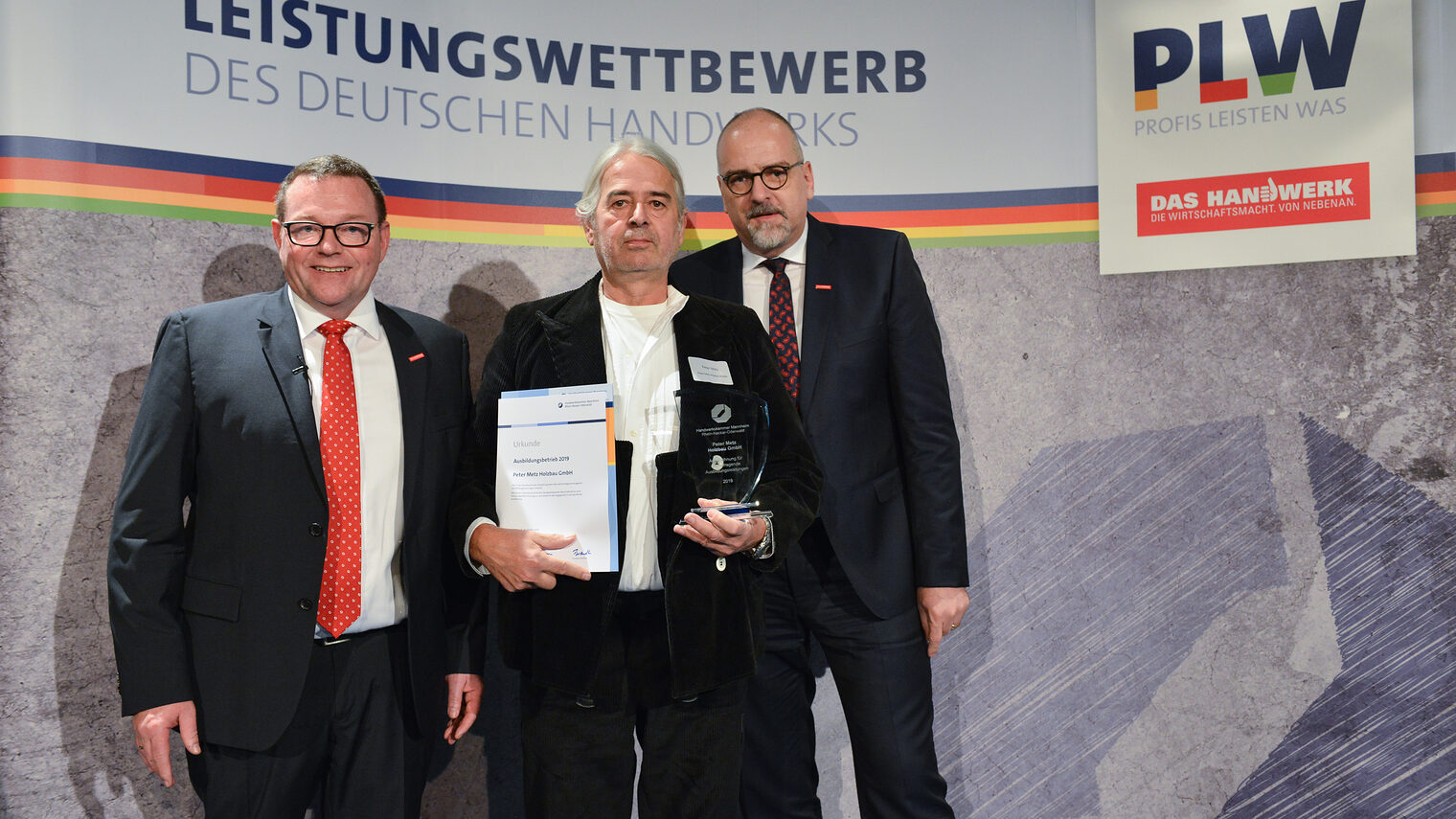© Thomas Rittelmann | (v.l.n.r.): Präsident Klaus Hofmann, Peter Metz, Hauptgeschäftsführer Jens Brandt