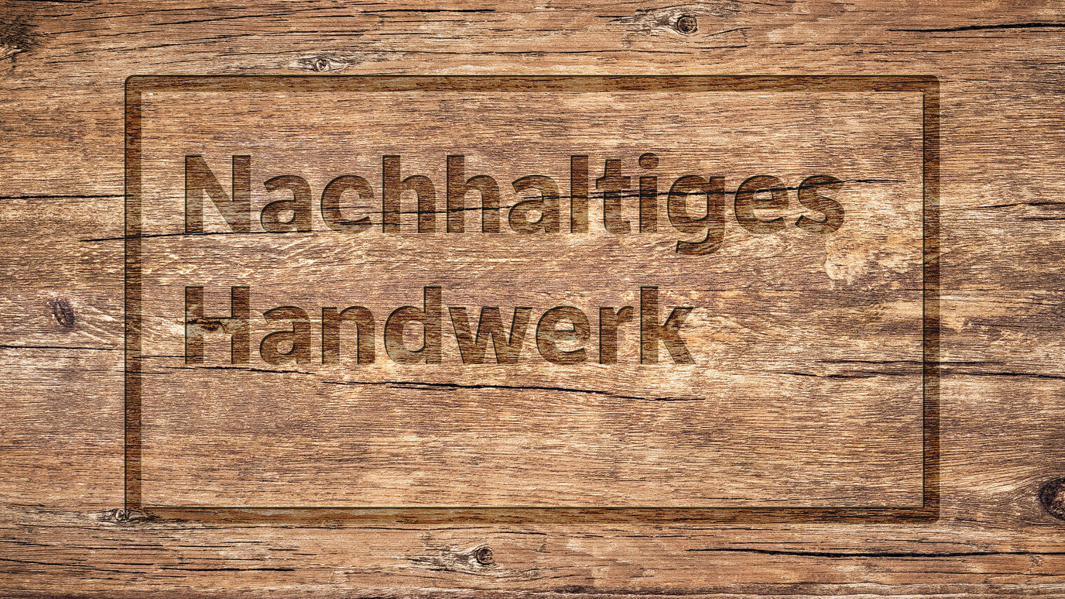 Holzplatte in der visuell vertieft folgendes steht: Nachhaltiges Handwerk - zukunftsorientiert und verantwortungsvoll