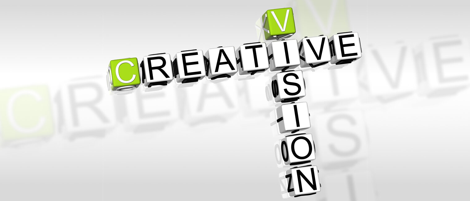Scrabble mit den Wörtern Creative und Vision 