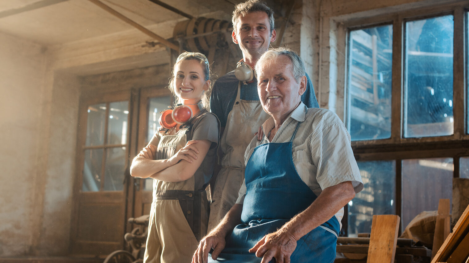 Drei Handwerker in Ihrer Werkstatt
