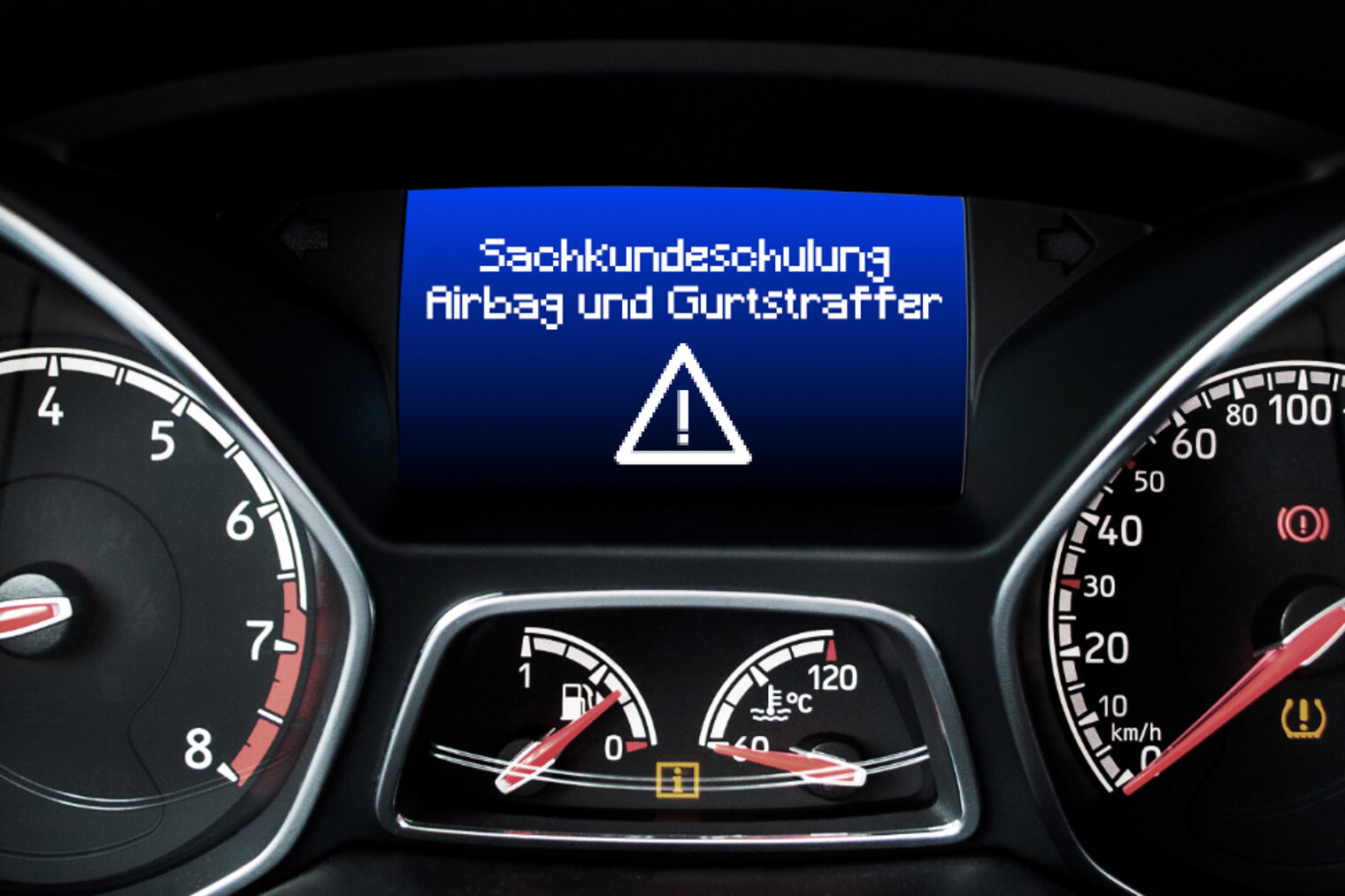 Kfz-Cockpit mit Drehzahlmesser, Tank- und Wassertemperaturanzeige sowie Geschwindigkeitsanzeige mit Bordcomputer auf dem steht: Sachkundeschulung Airbag und Gurtstraffer