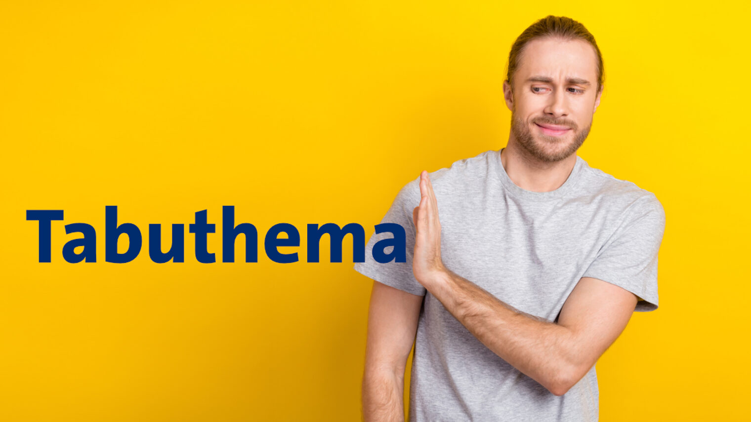 Mann mit abwehrender Hand, die das Wort "Tabuthema" abhält
